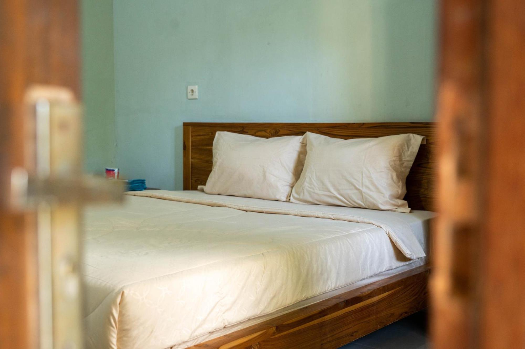 Join Homestay Kuta  Buitenkant foto