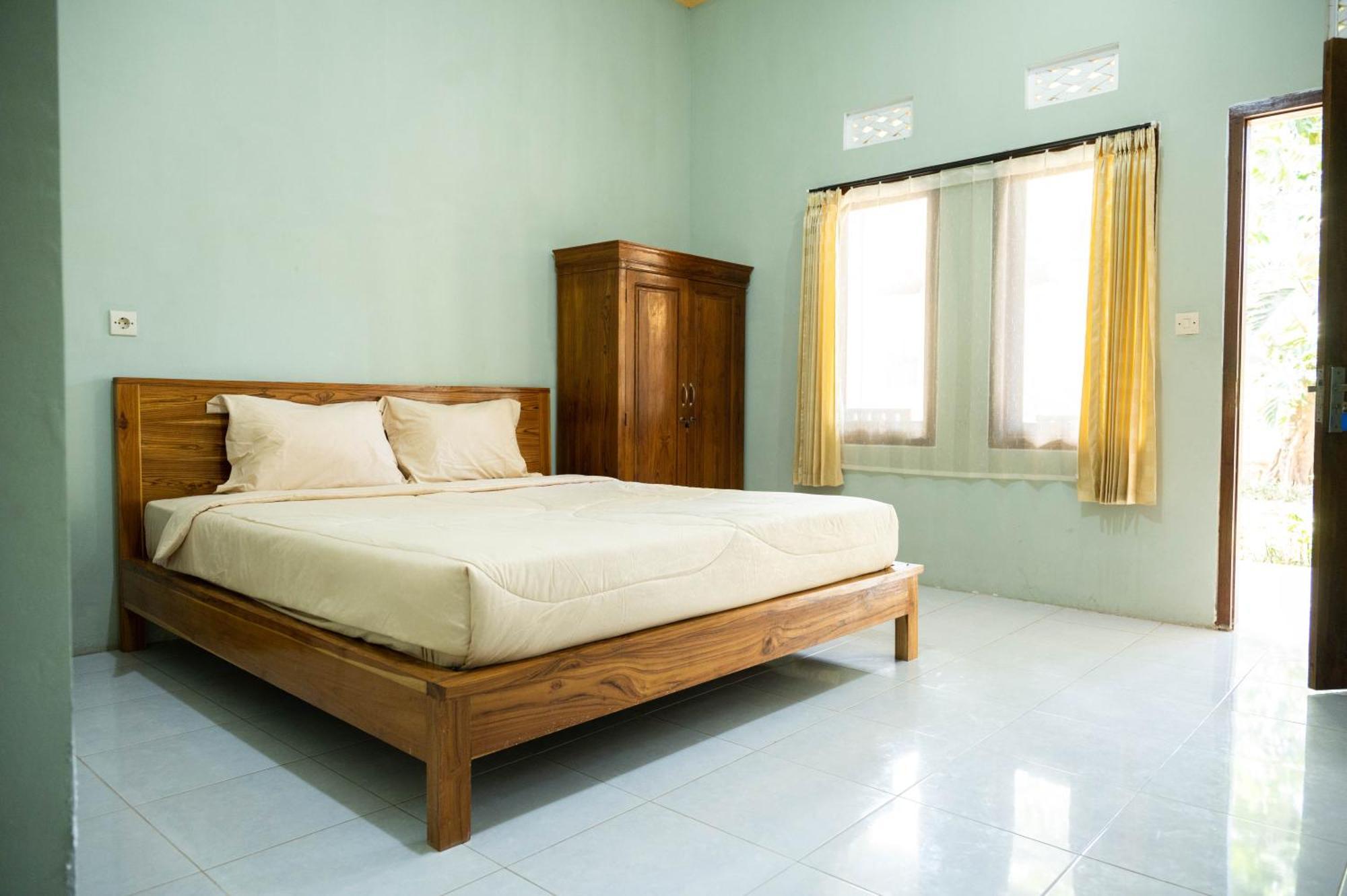 Join Homestay Kuta  Buitenkant foto