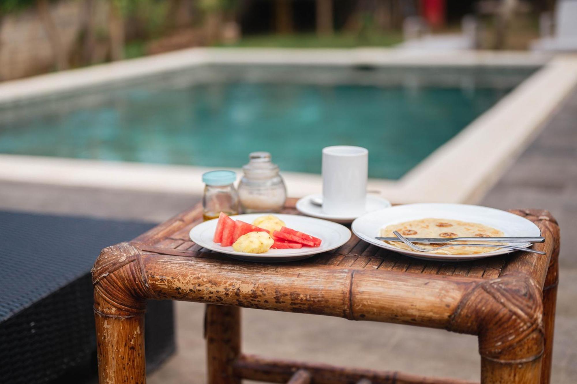 Join Homestay Kuta  Buitenkant foto