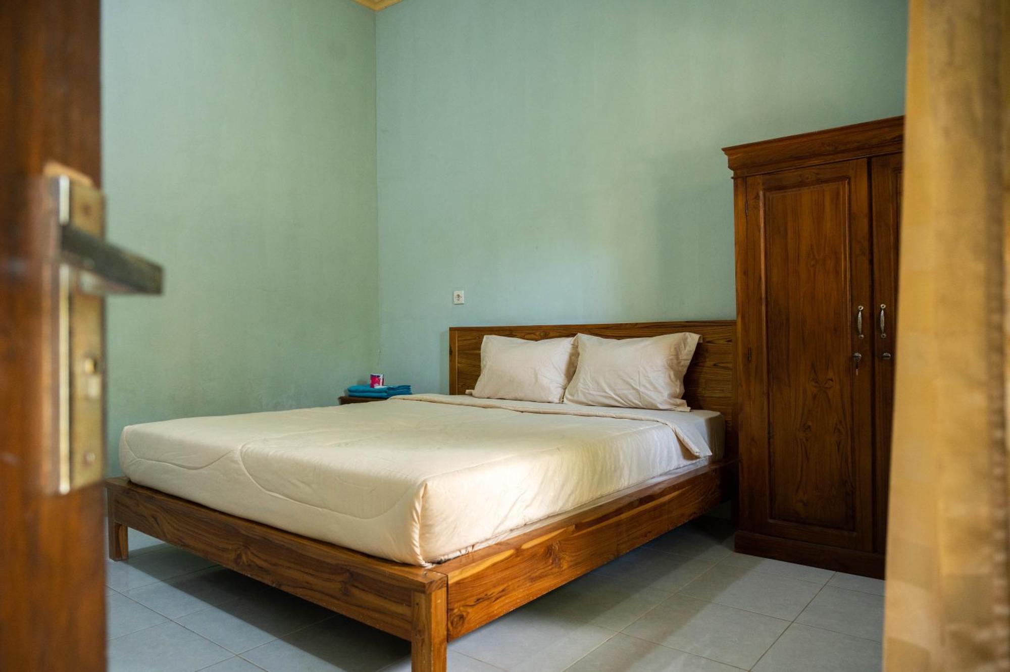 Join Homestay Kuta  Buitenkant foto