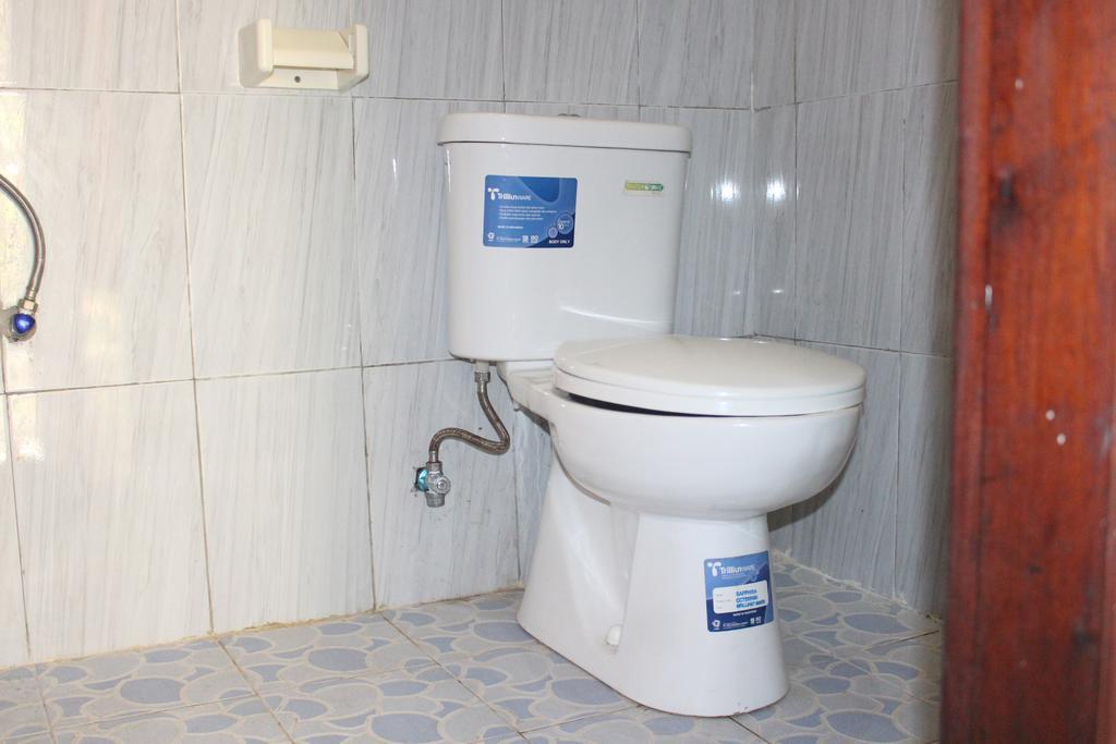 Join Homestay Kuta  Buitenkant foto